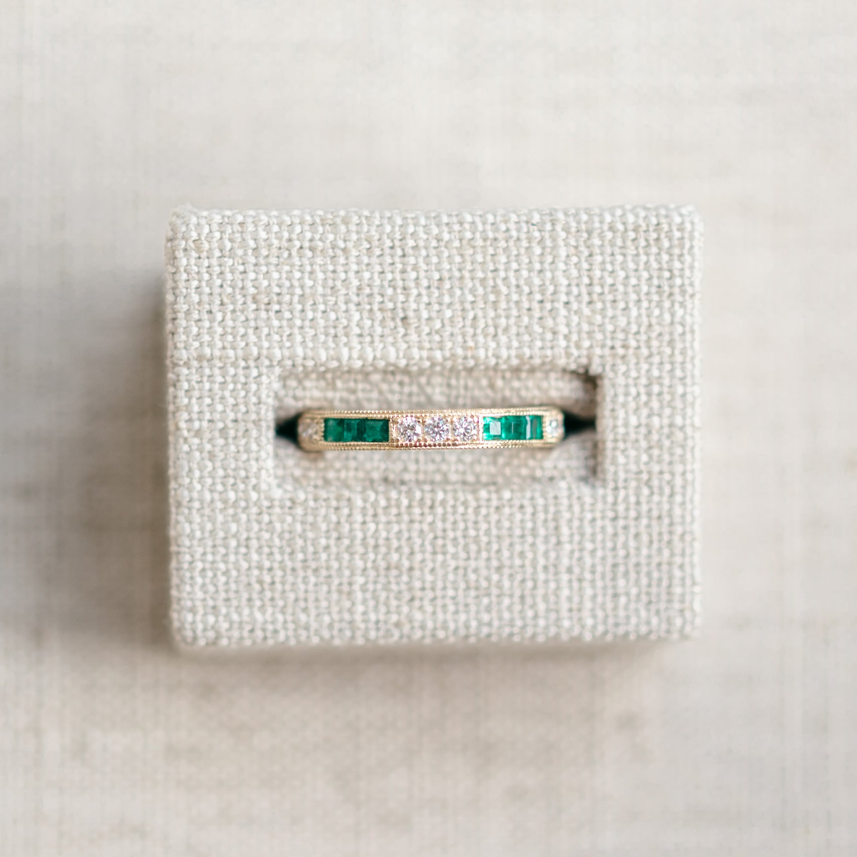emerald and diamond yellow gold band