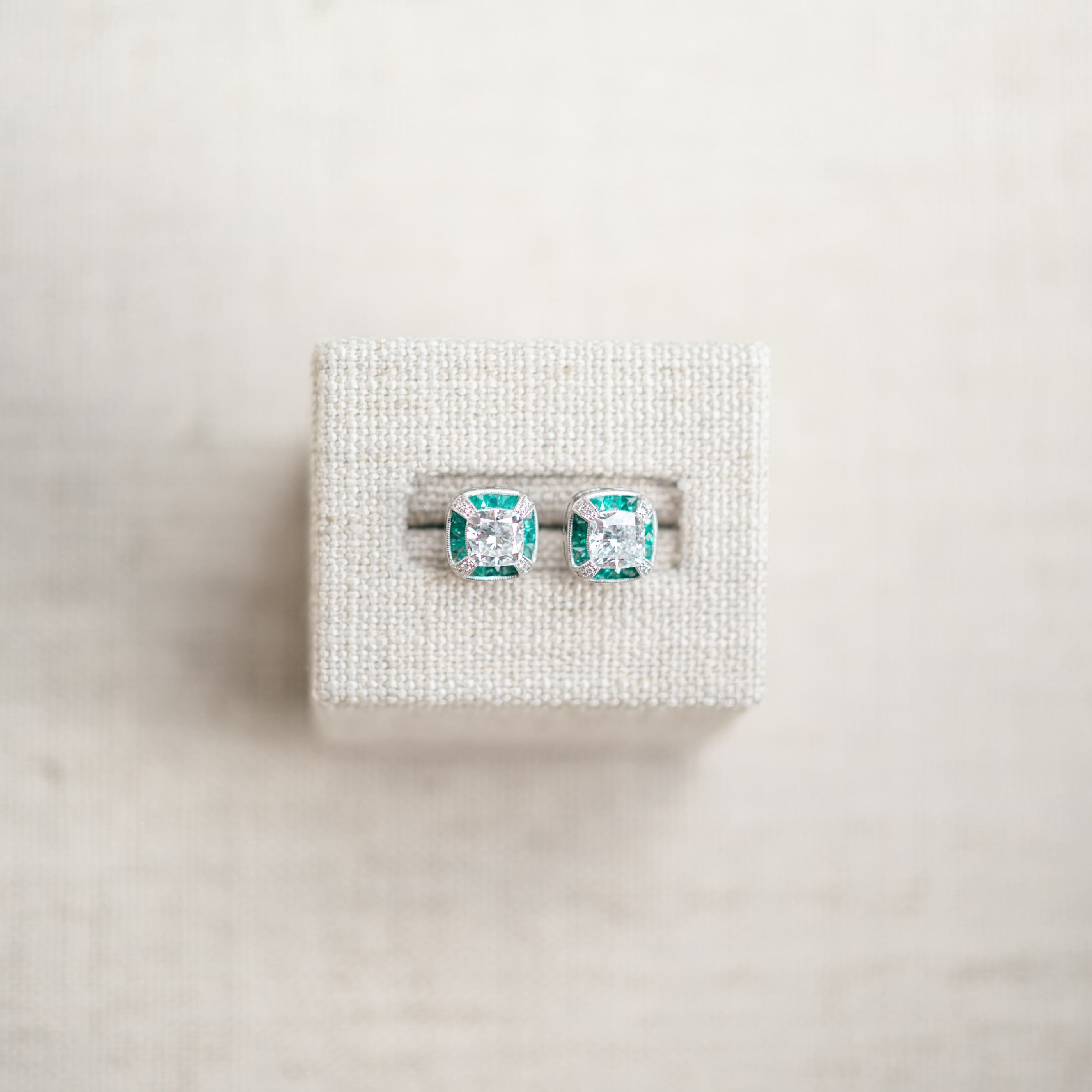 vintage inspired diamond and emerald halo earrings