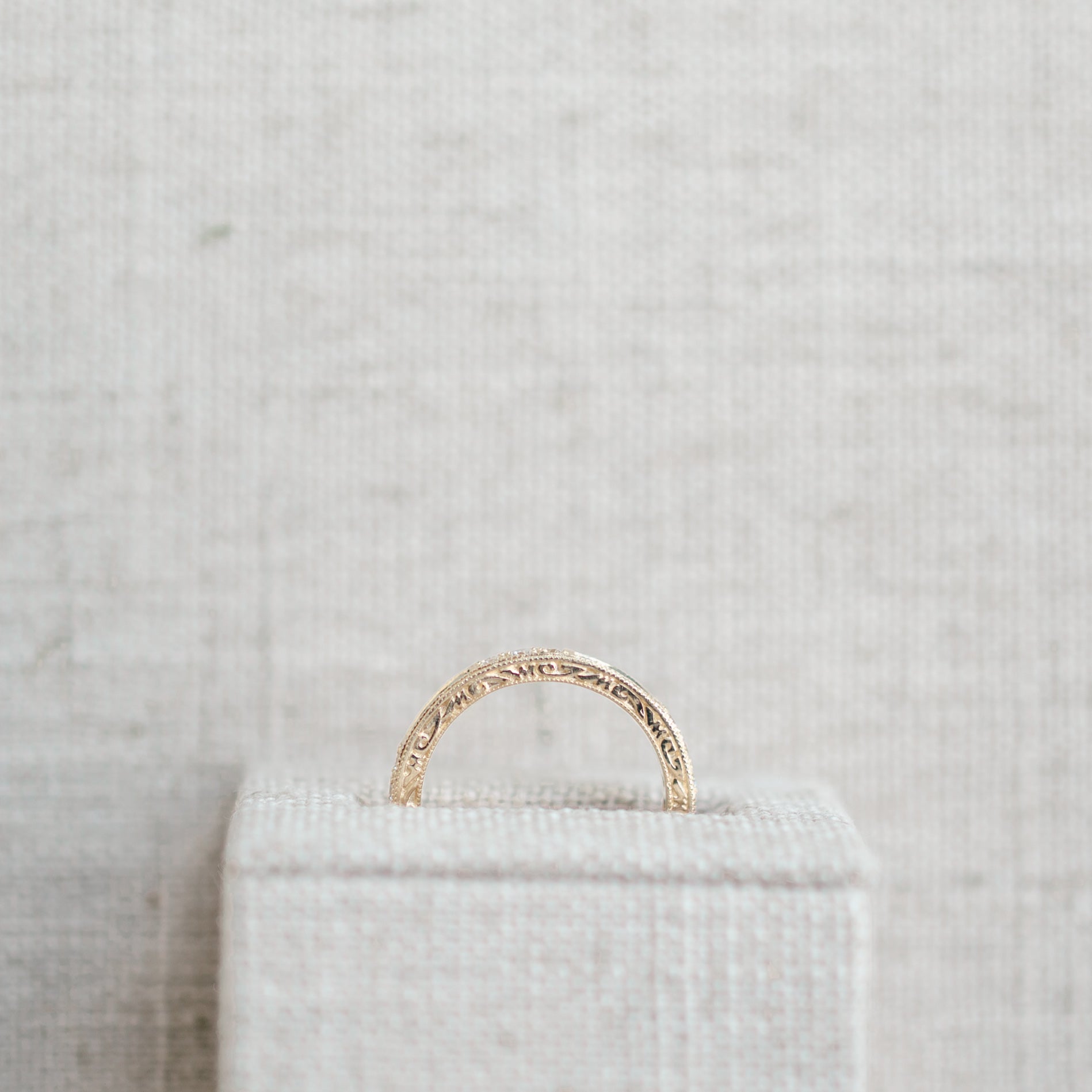 emerald and diamond yellow gold band
