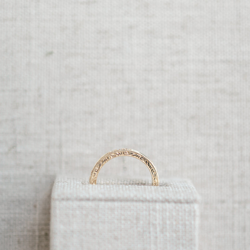 emerald and diamond yellow gold band