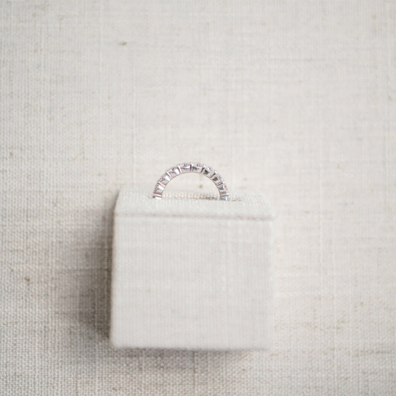 shared prong diamond eternity band