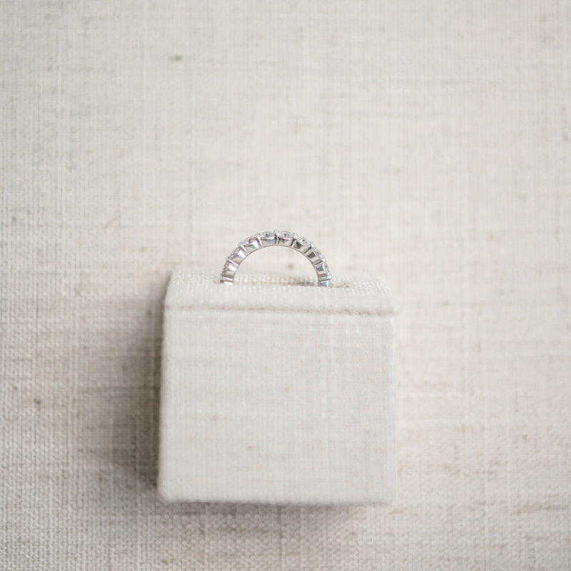 shared prong diamond eternity band