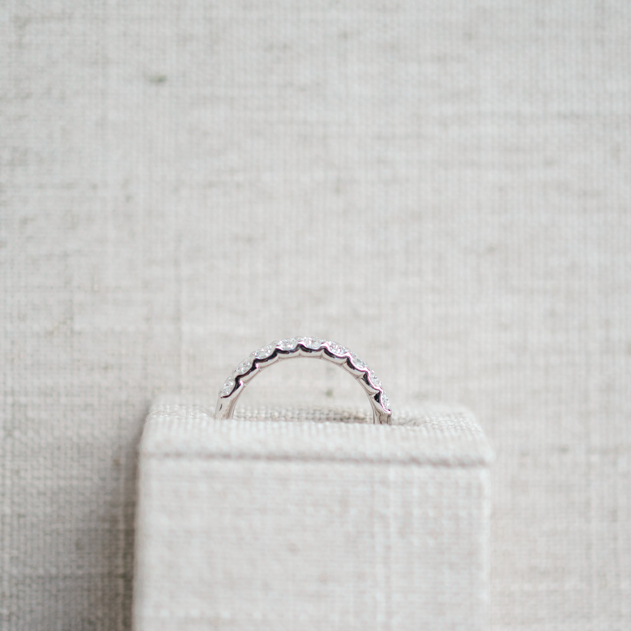 oval diamond half eternity band