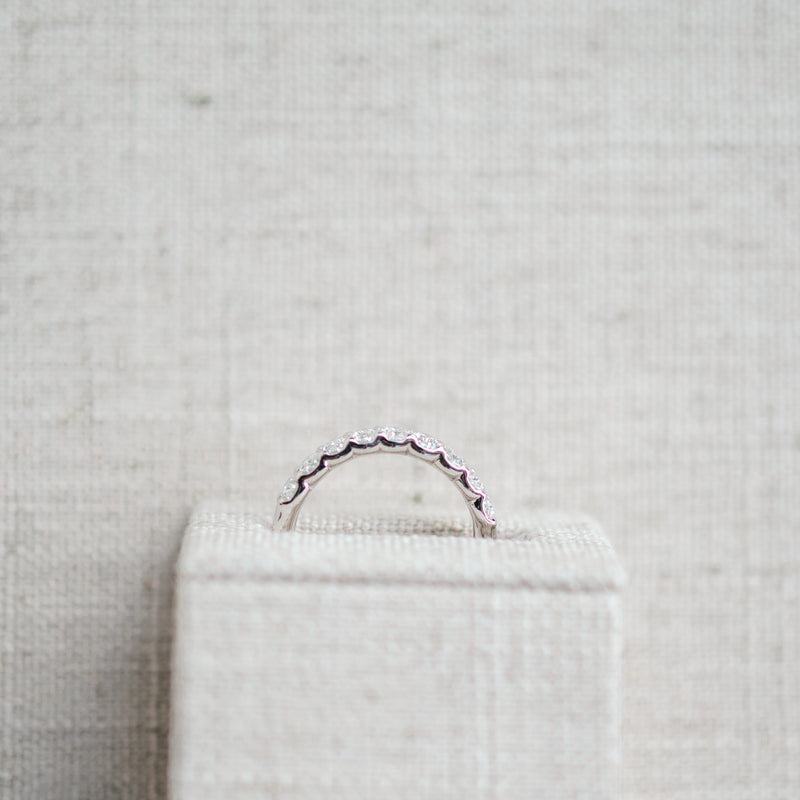 oval diamond half eternity band