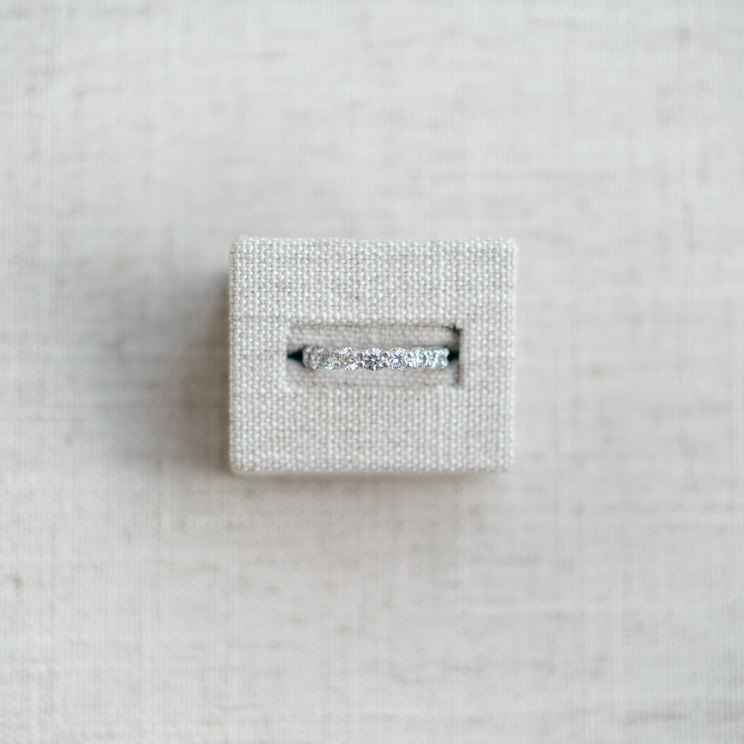 shared prong diamond eternity band