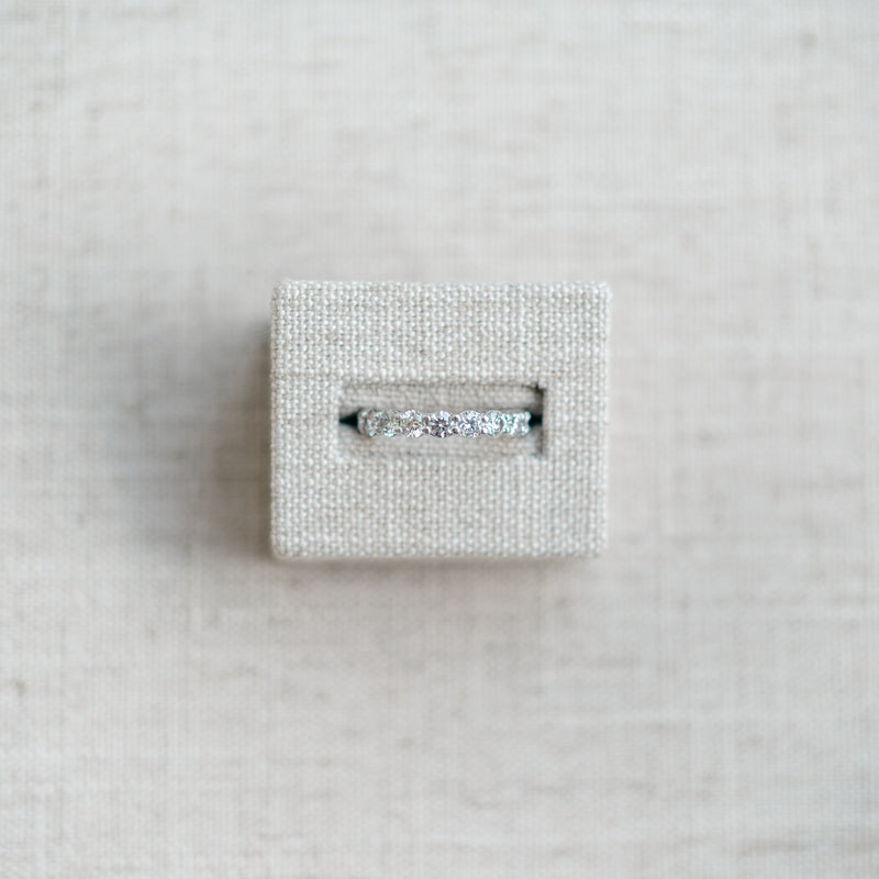 shared prong diamond eternity band