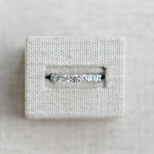 shared prong diamond eternity band