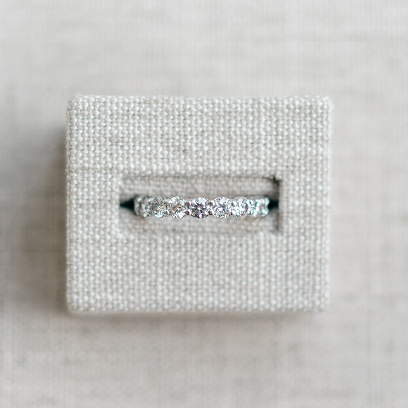shared prong diamond eternity band