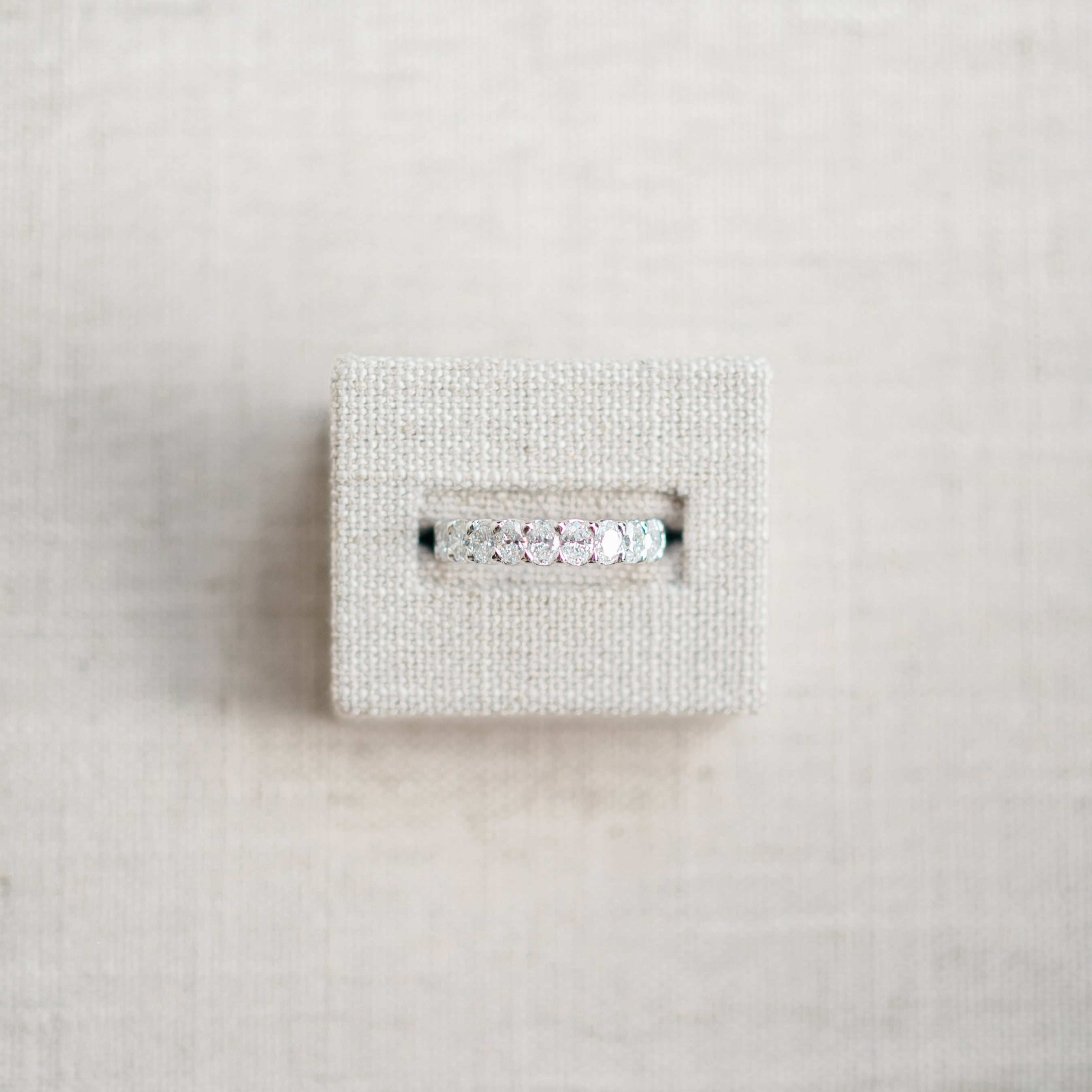 oval diamond half eternity band