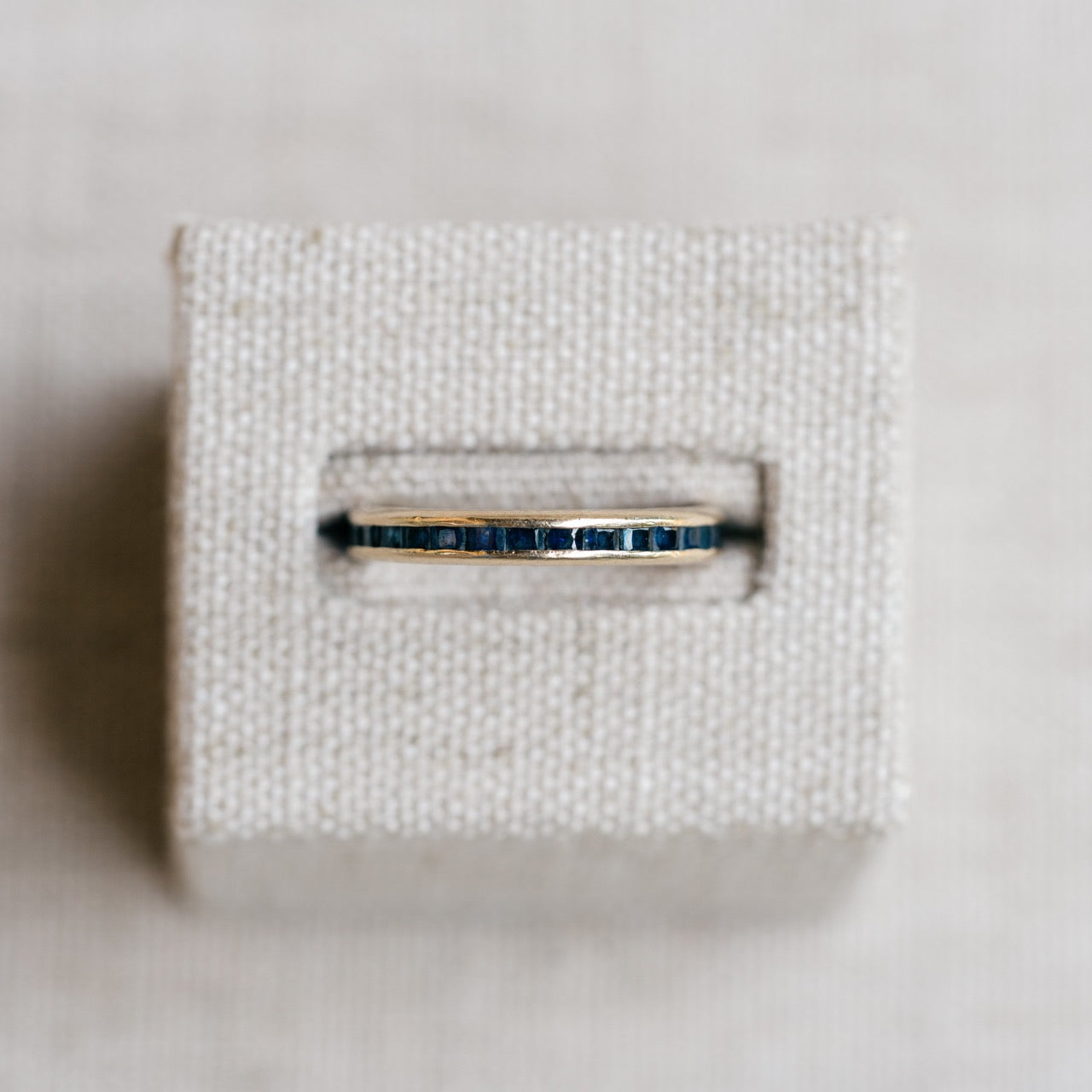 yellow gold french cut sapphire eternity band
