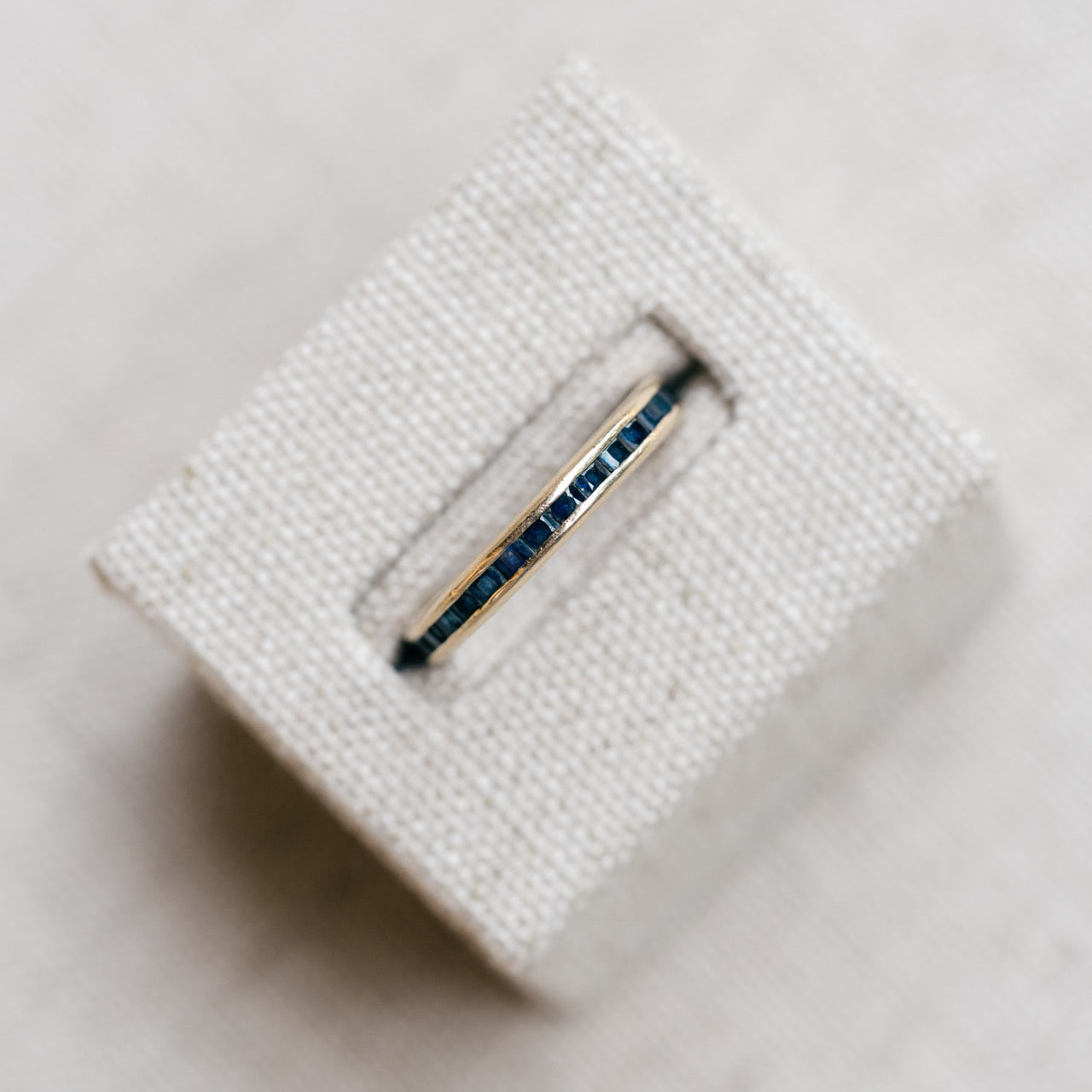 yellow gold french cut sapphire eternity band