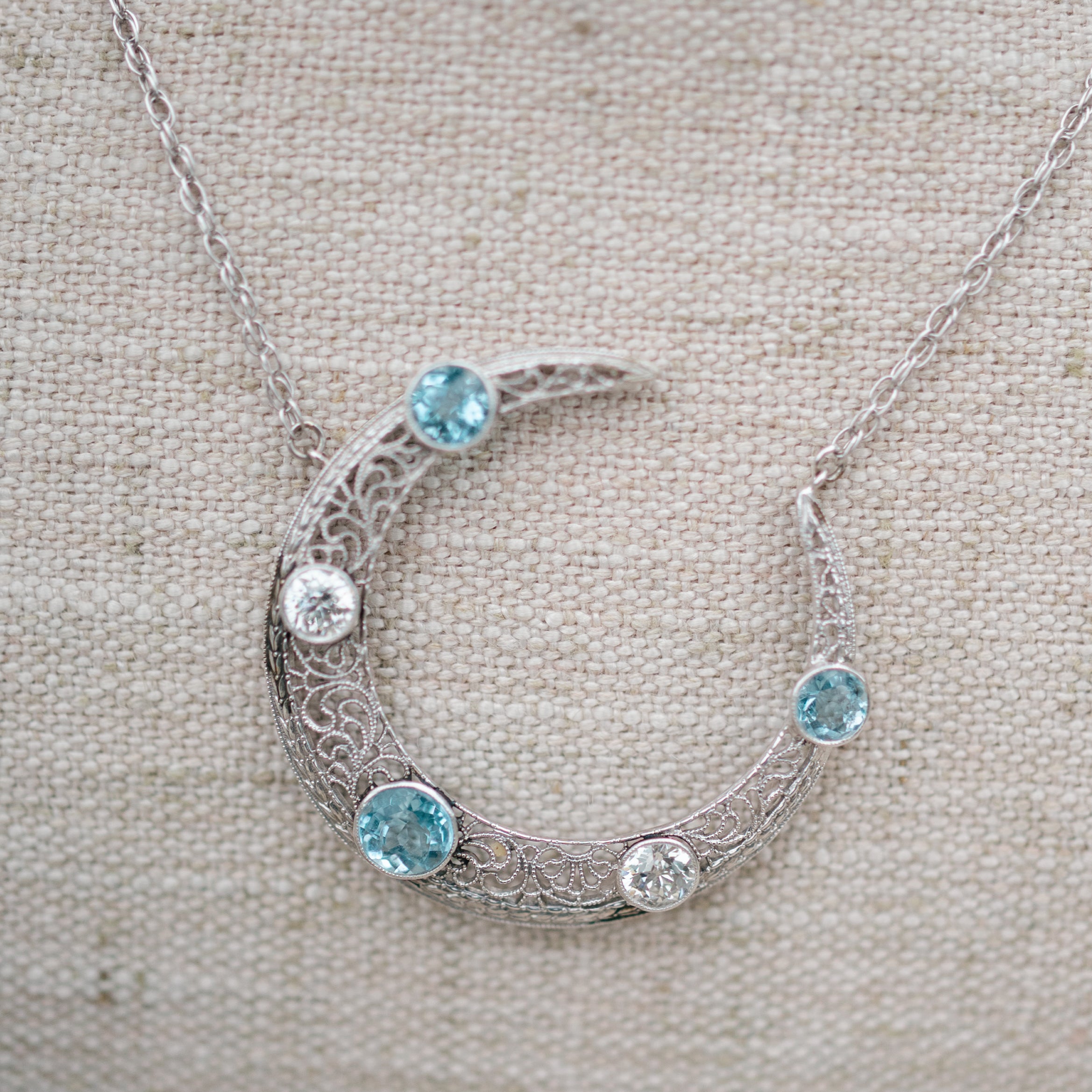 Aquamarine and Diamond Crescent Pendant