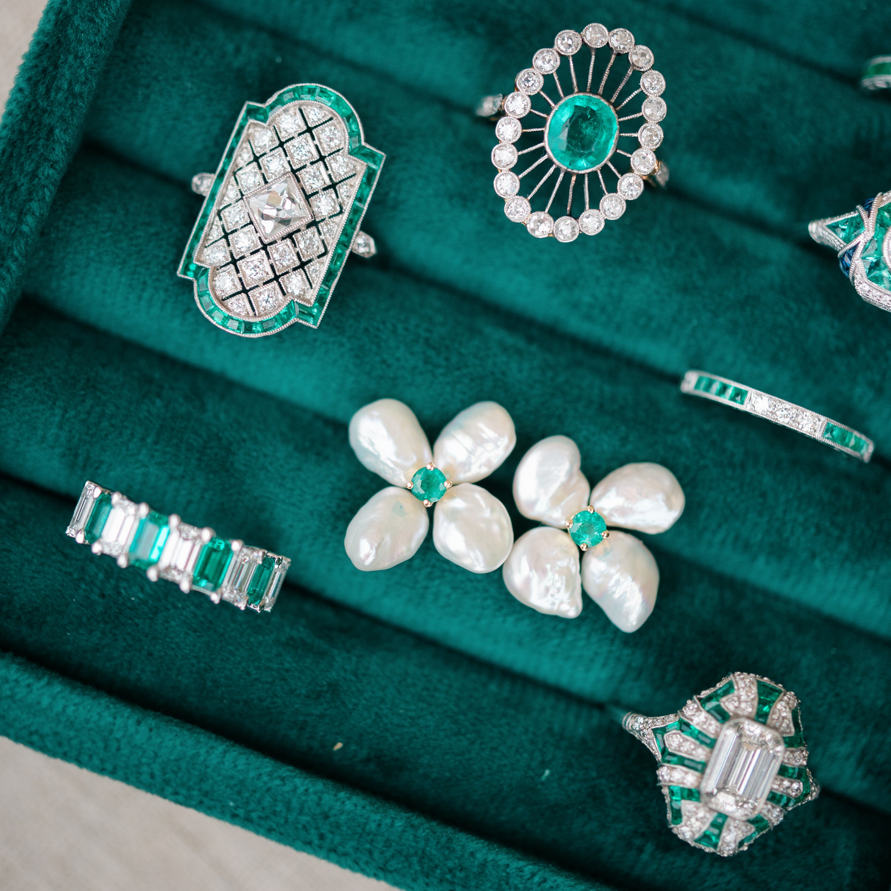emerald and pearl petal studs