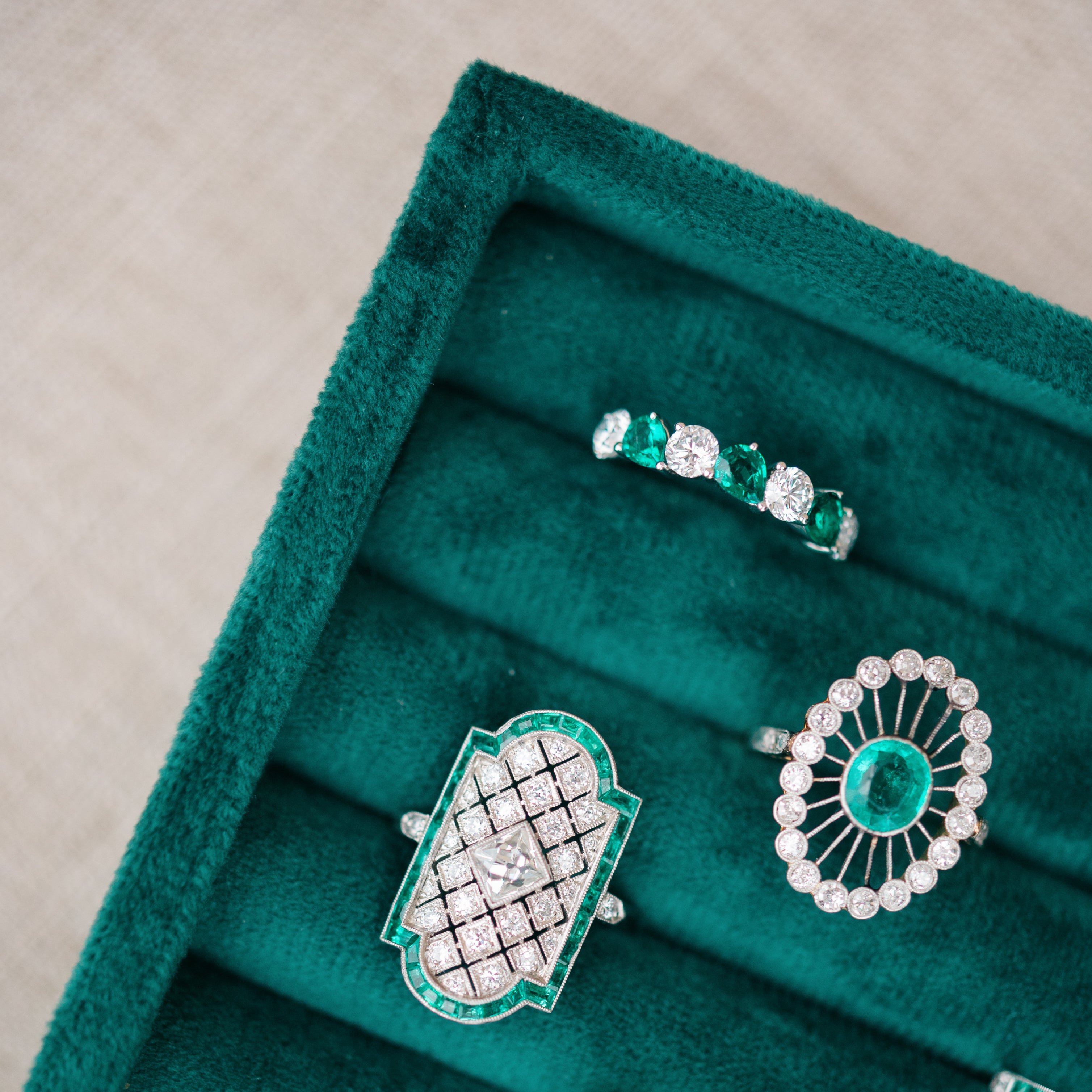pear shaped emerald and diamond band