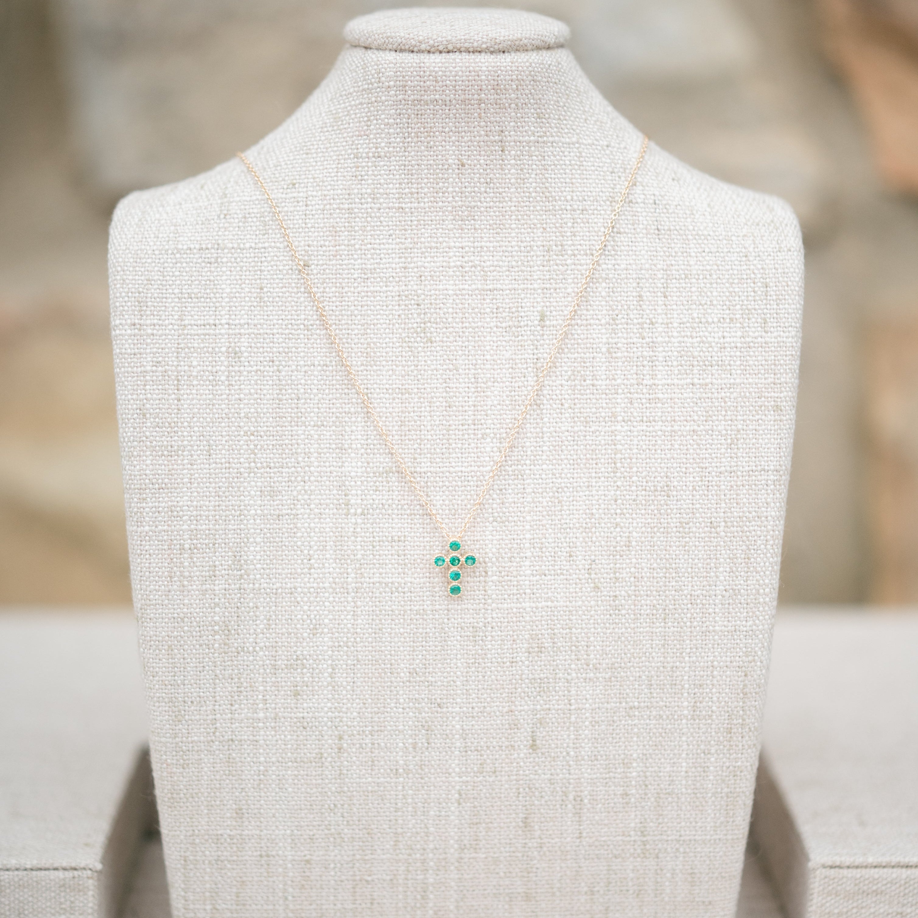 Emerald bezel cross