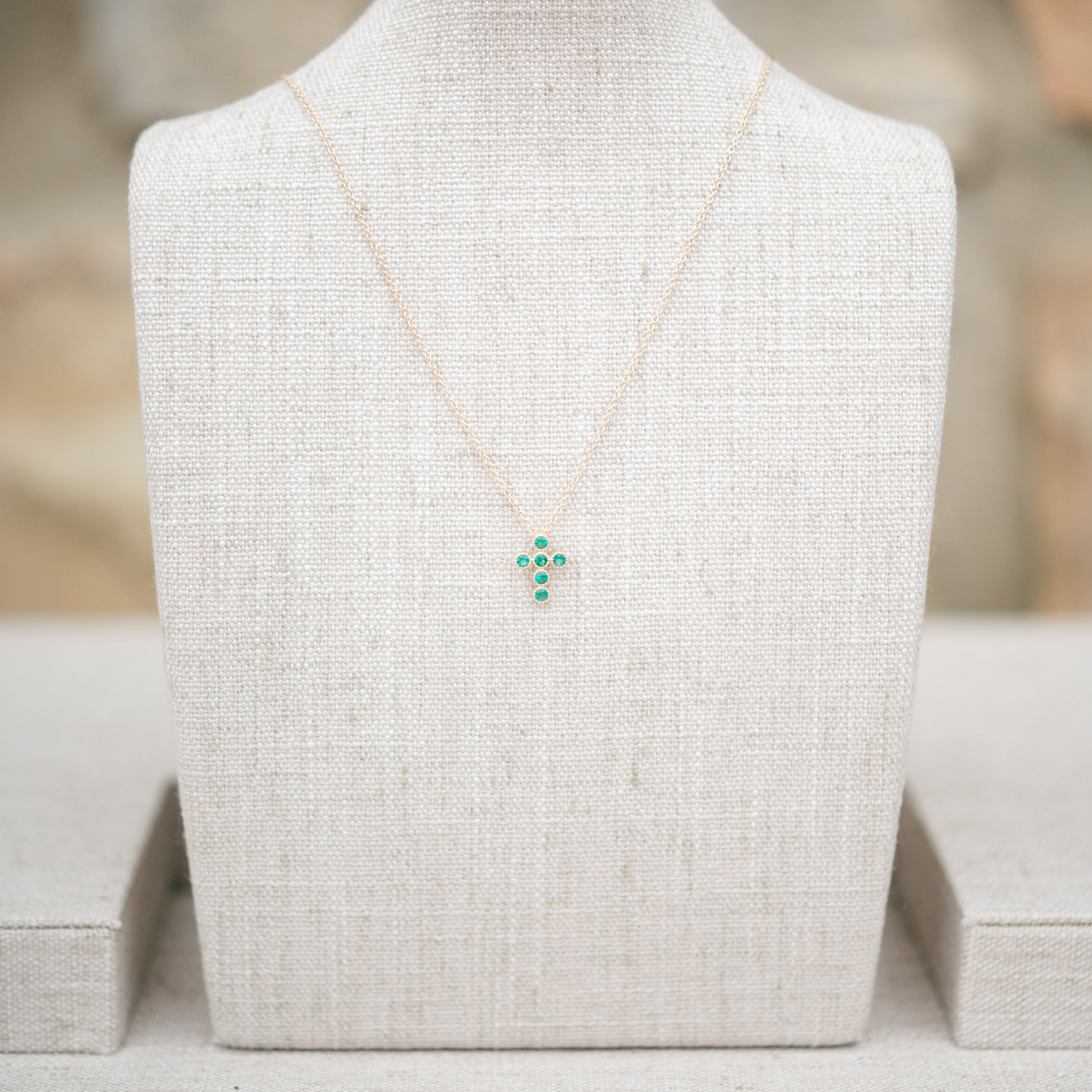 Emerald bezel cross