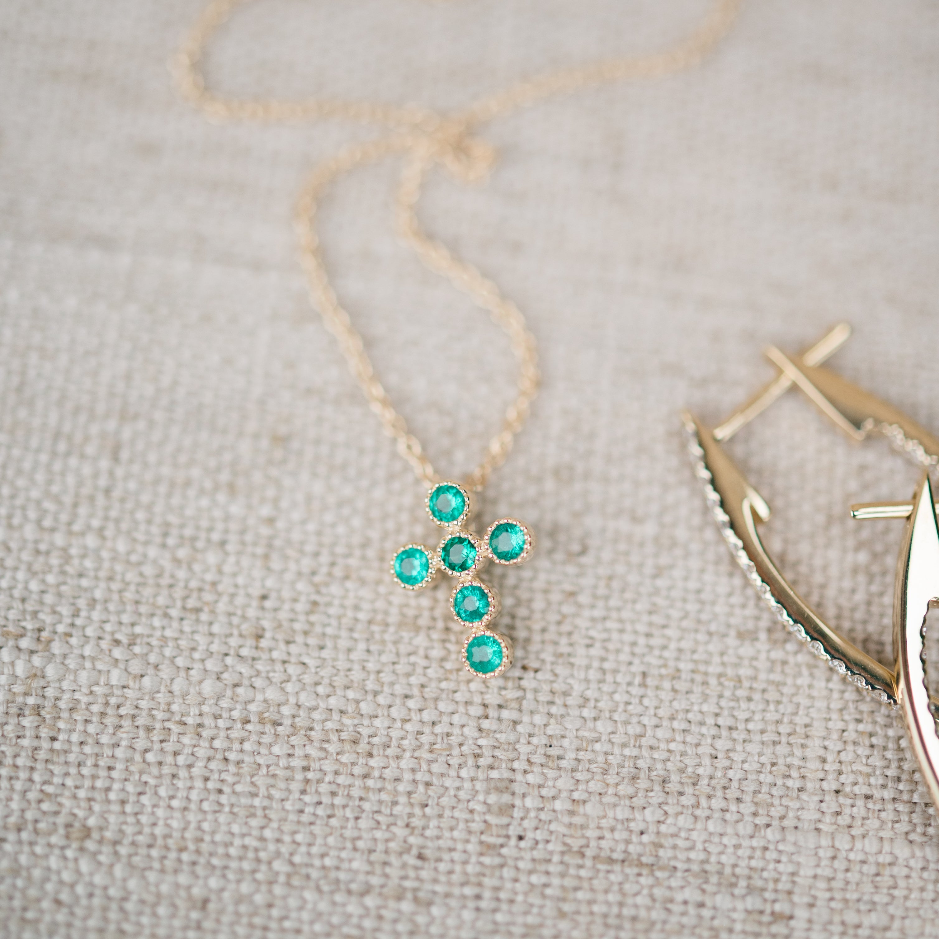 Emerald bezel cross