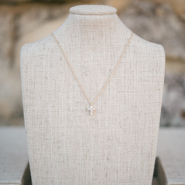Yellow gold petite diamond cross