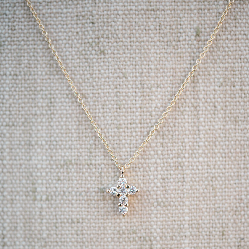 Yellow gold petite diamond cross