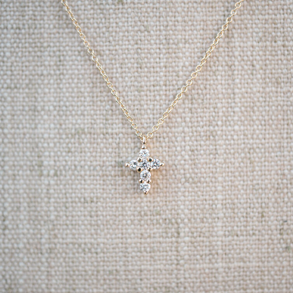 Yellow gold petite diamond cross