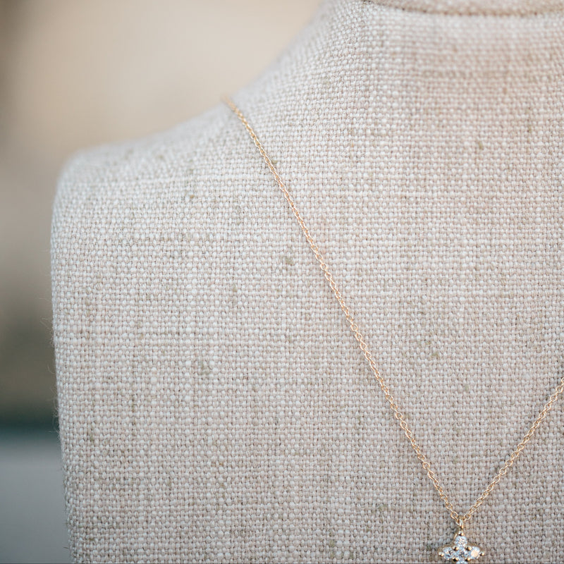 Yellow gold petite diamond cross