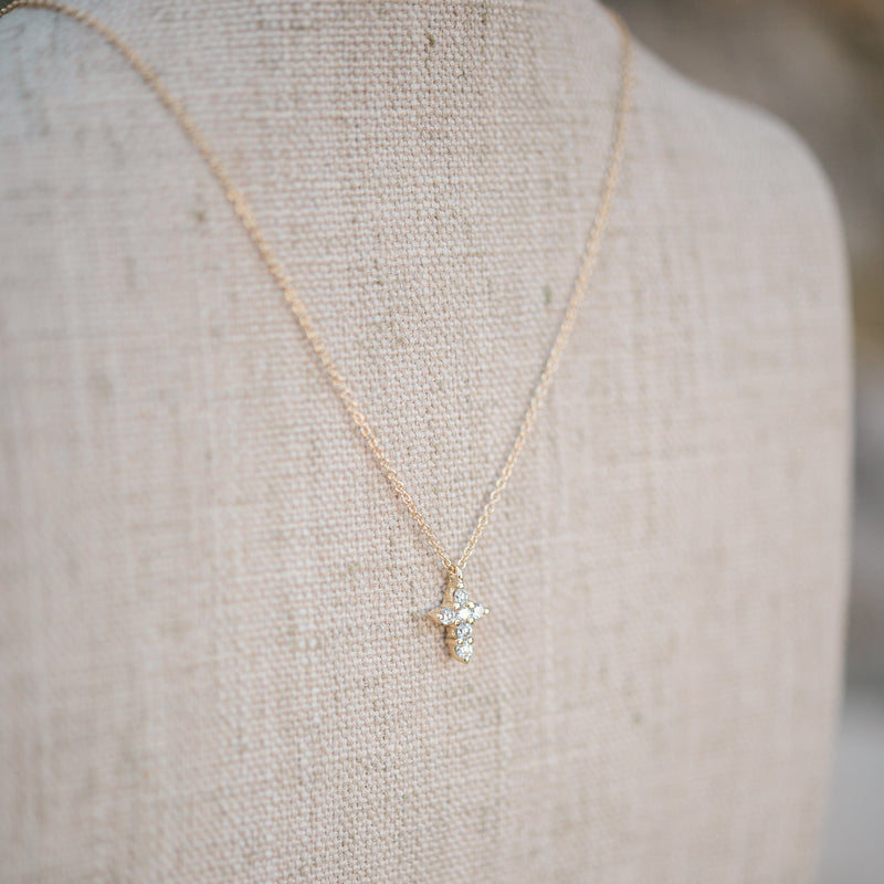 Yellow gold petite diamond cross