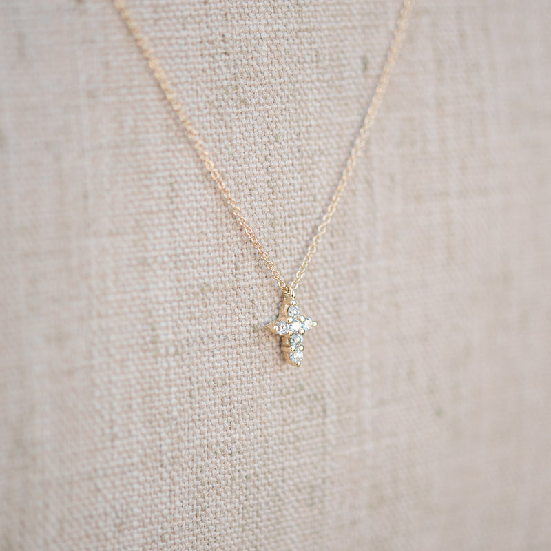 Yellow gold petite diamond cross