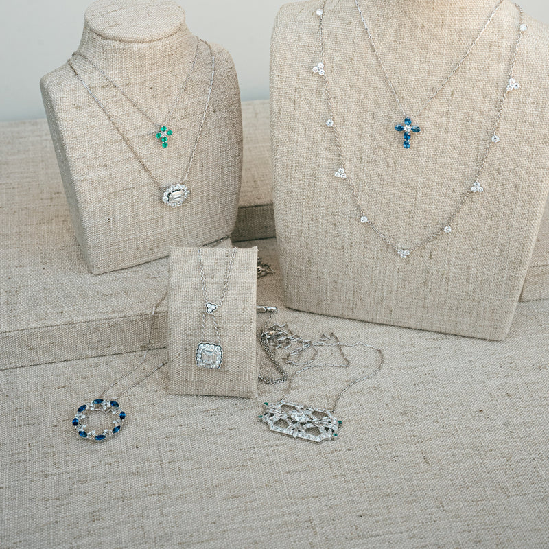 emerald cut diamond and scalloped diamond halo necklace