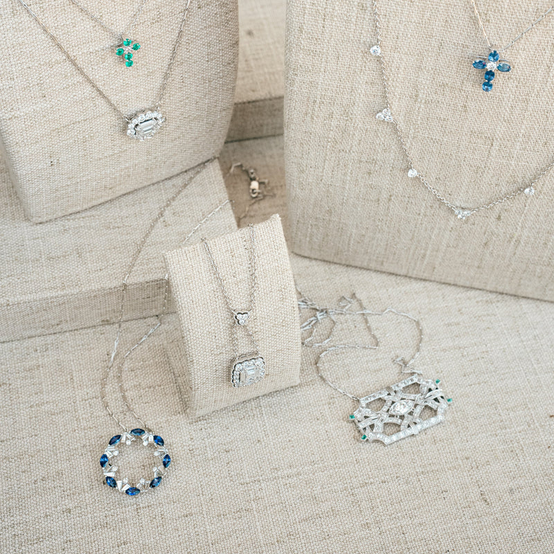 blue sapphire and diamond cross