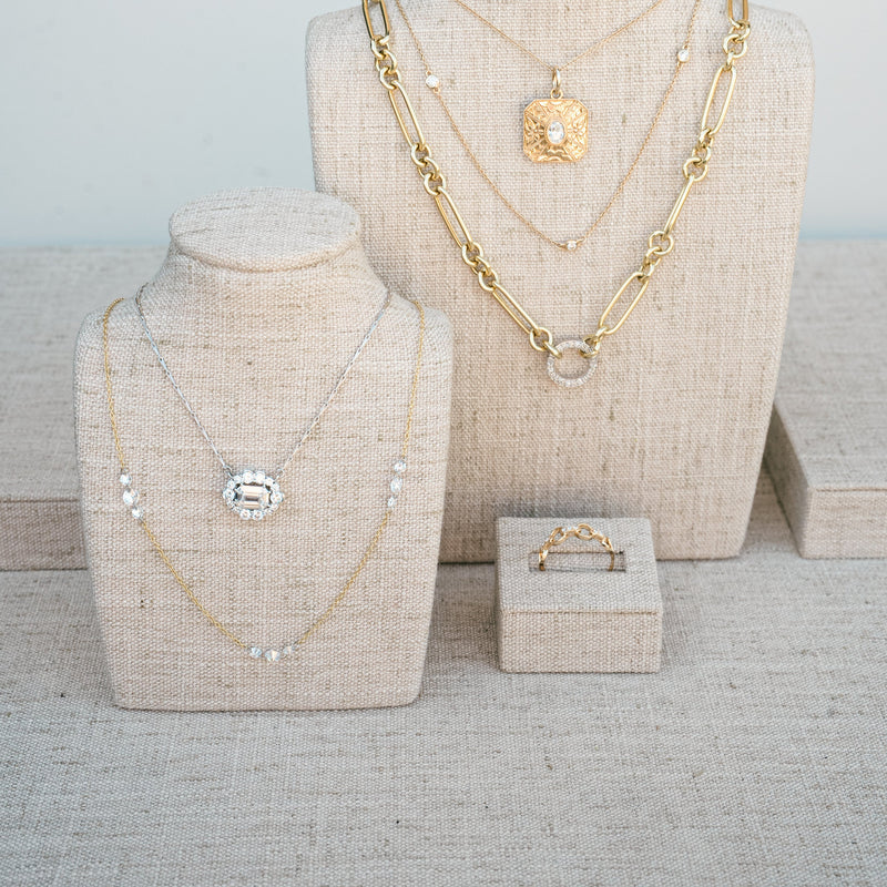 emerald cut diamond with diamond halo necklace