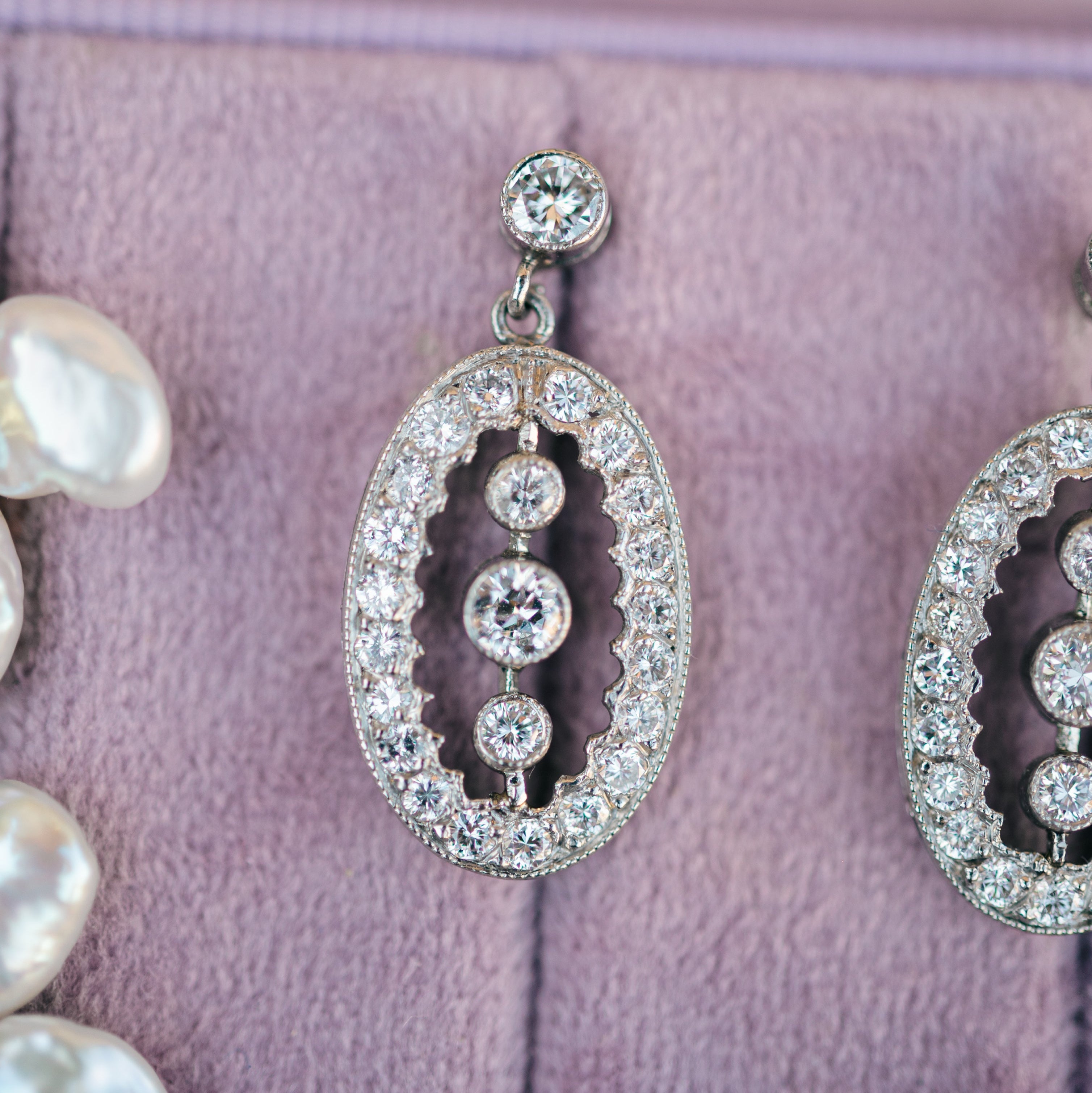 platinum diamond dangle earrings