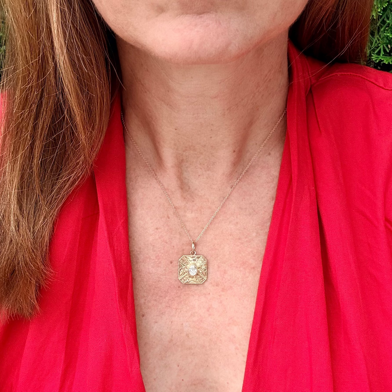 oval diamond engraved pendant