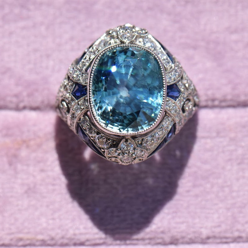 Blue zircon diamond and sapphire ring