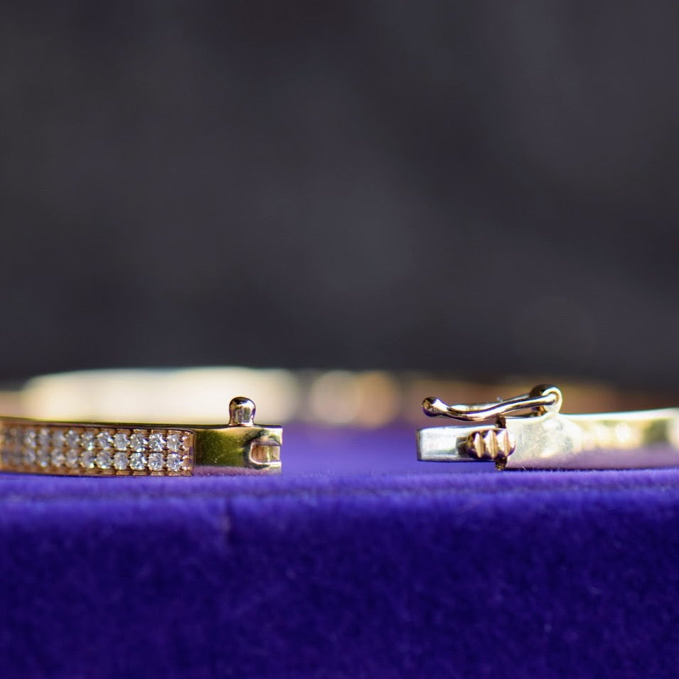 Emerald and diamond yellow gold bangle