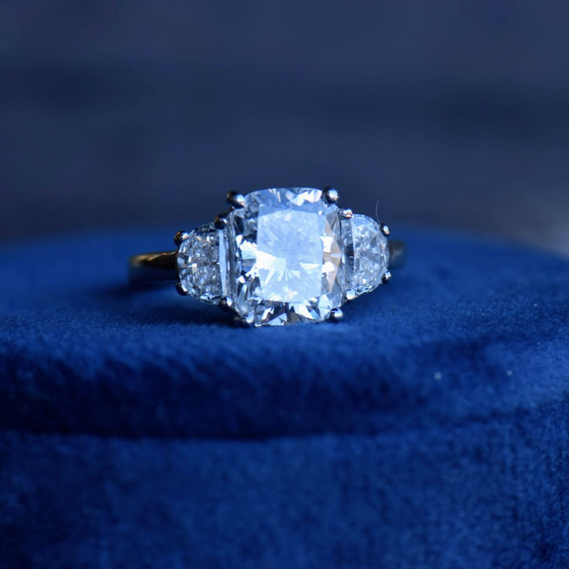 elongated cushion and half moon diamond ring