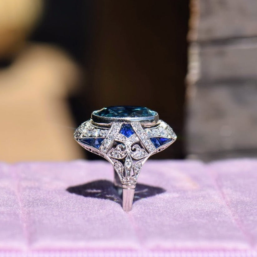 Blue zircon diamond and sapphire ring