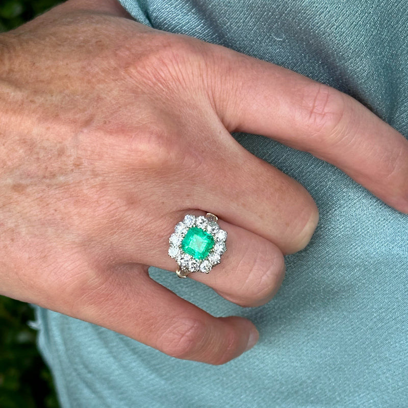 emerald and diamond mixed metal ring