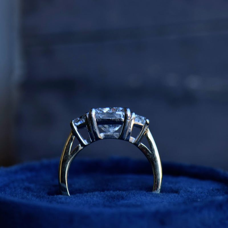 elongated cushion and half moon diamond ring