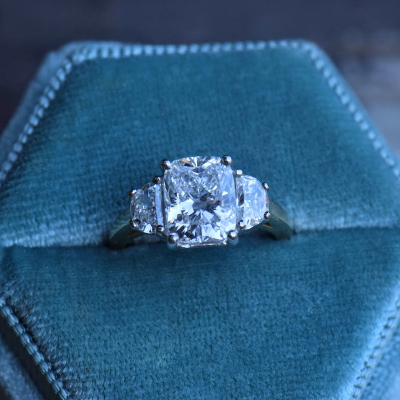 elongated cushion and half moon diamond ring