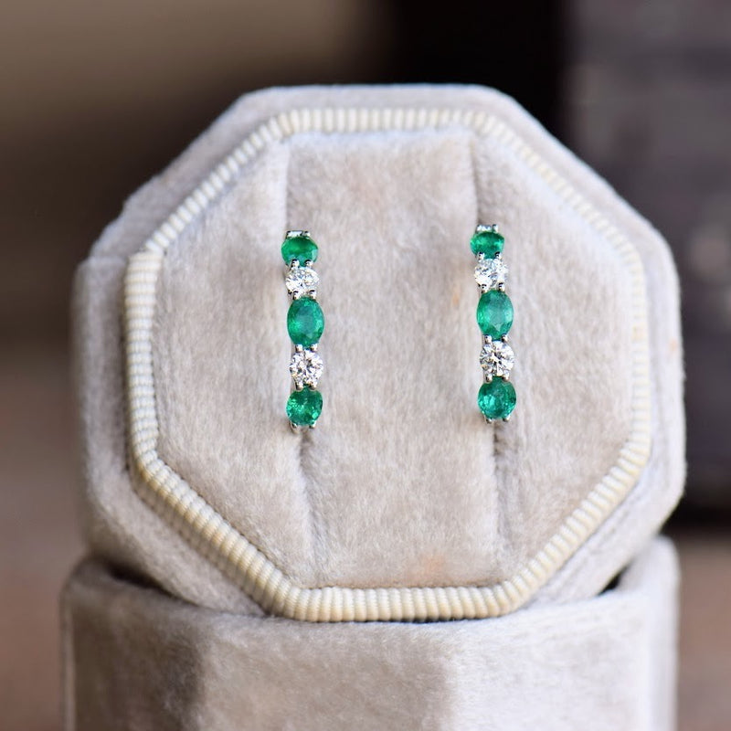 oval emerald and diamond hoops